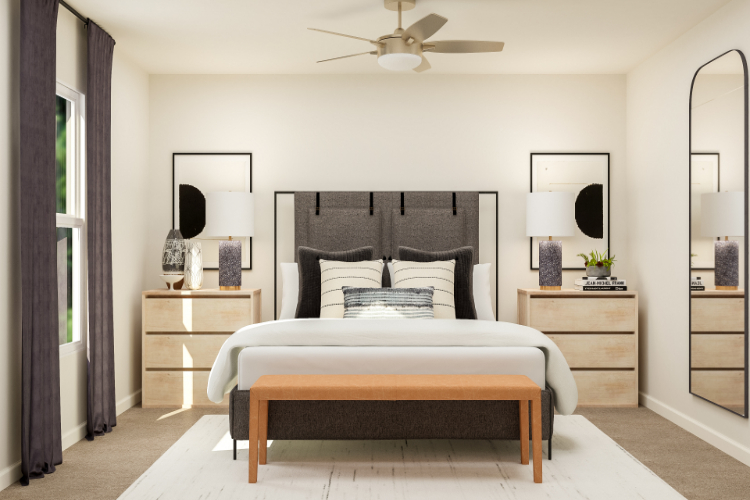 A bedroom with a bed and a bench.