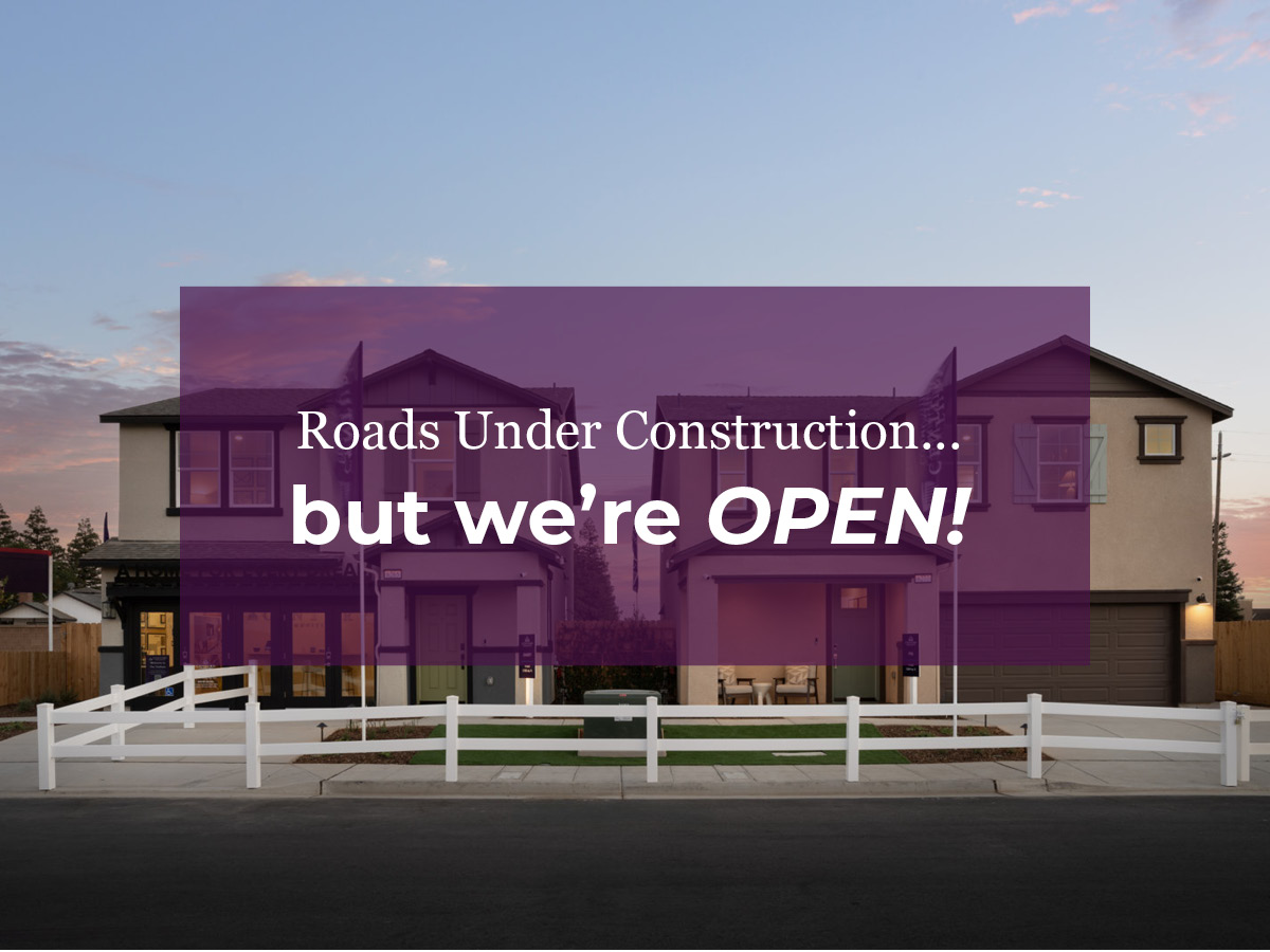 A building with a fence in front.