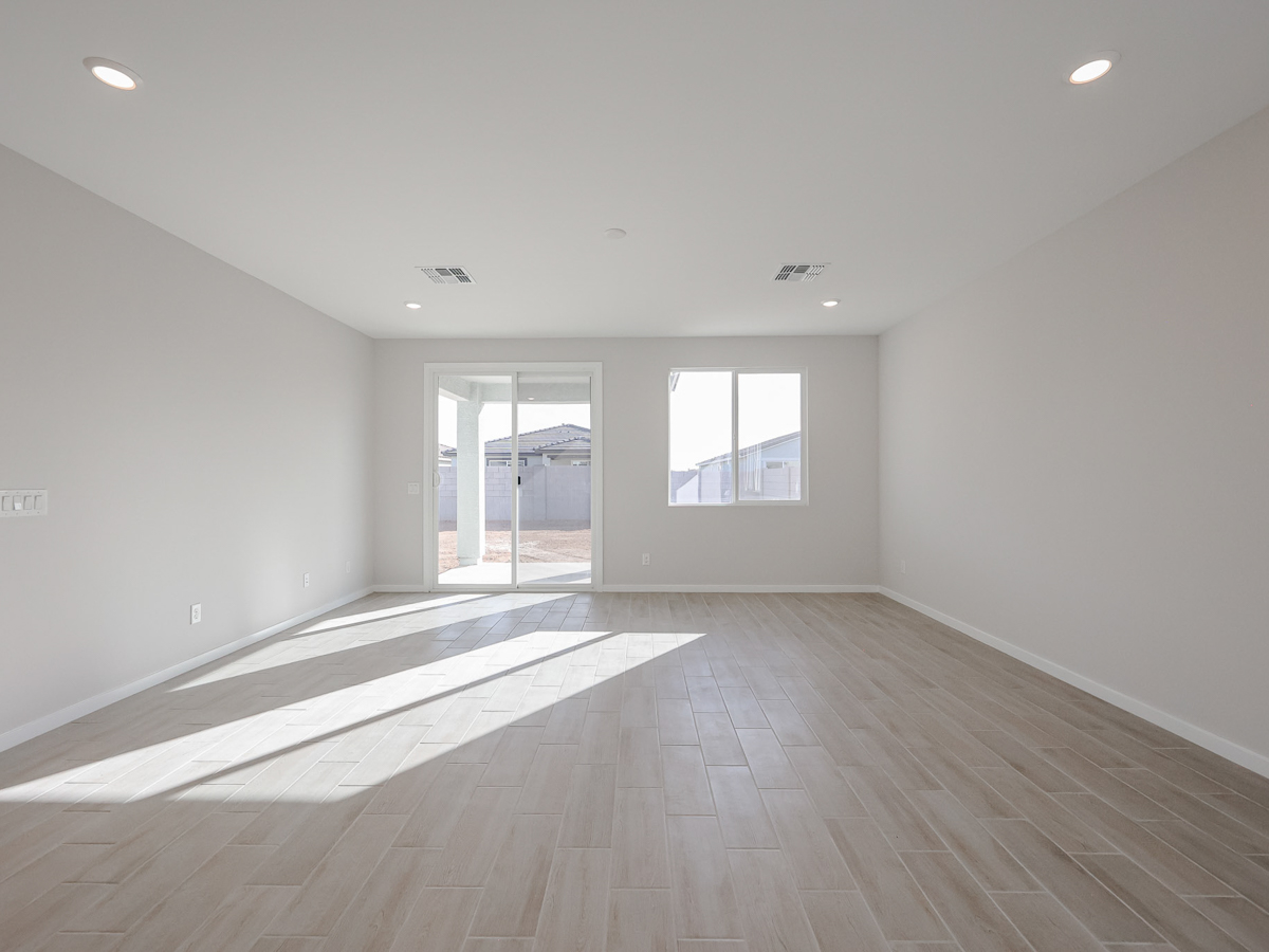 A room with a wood floor and a wood floor.