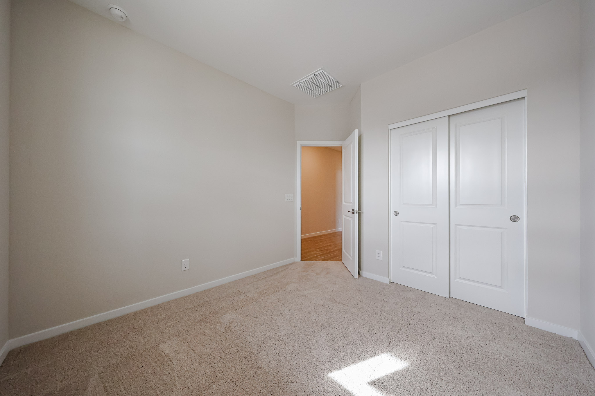 A room with white doors.