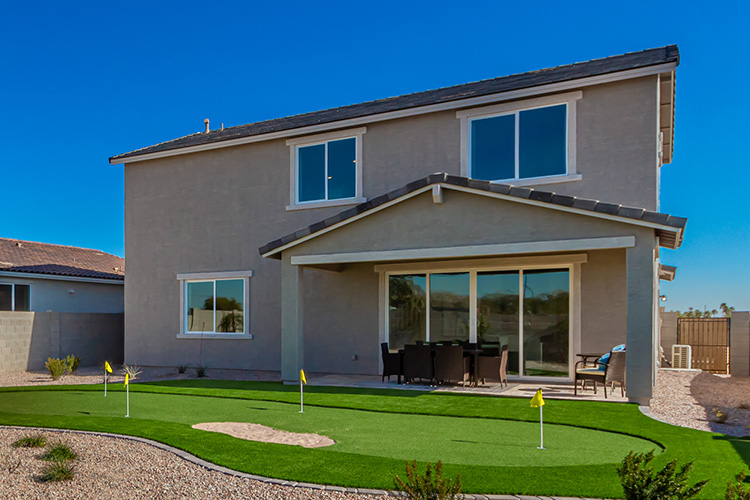 A house with a lawn.