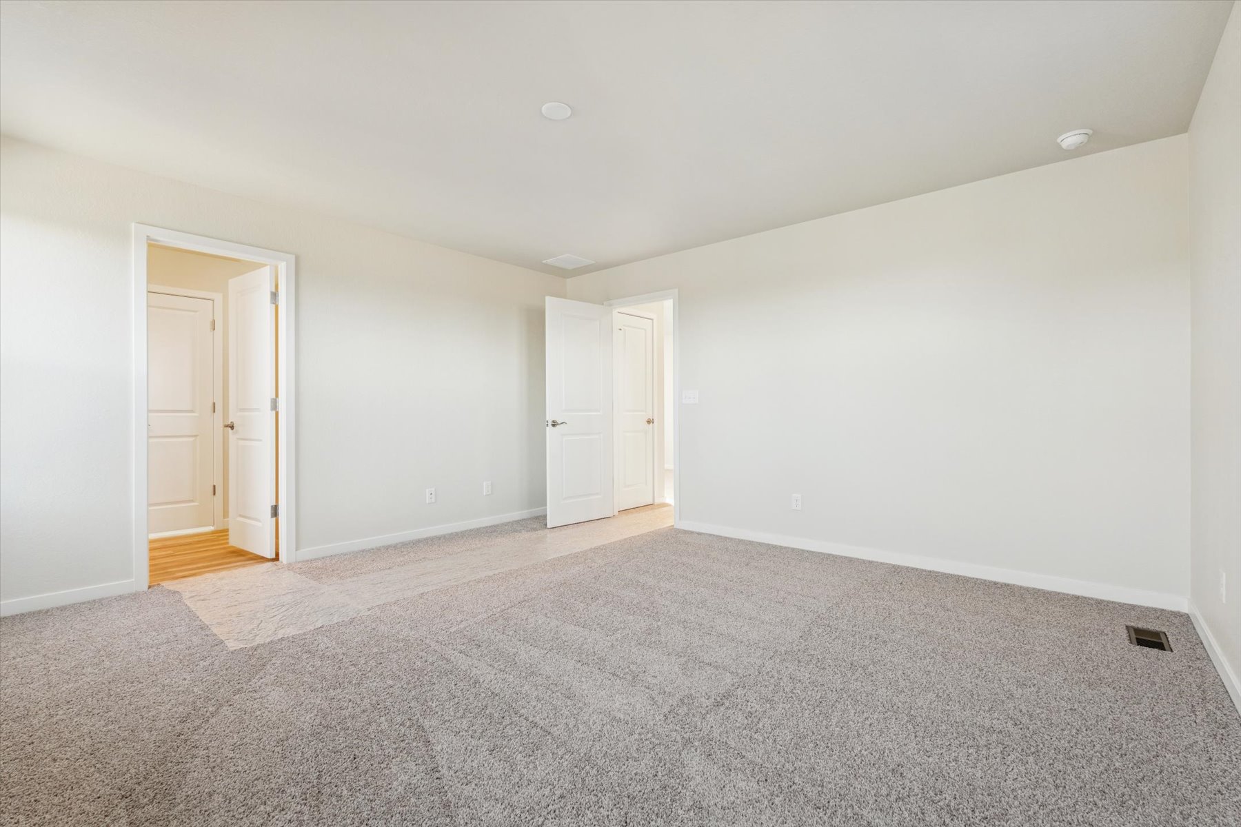 A room with white doors.