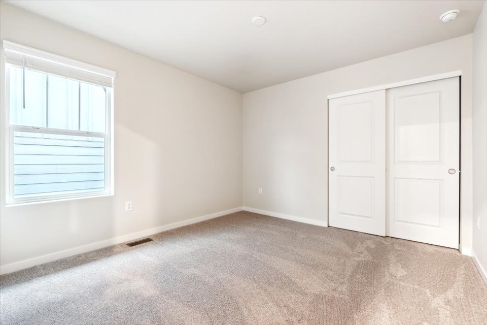 A room with white doors.