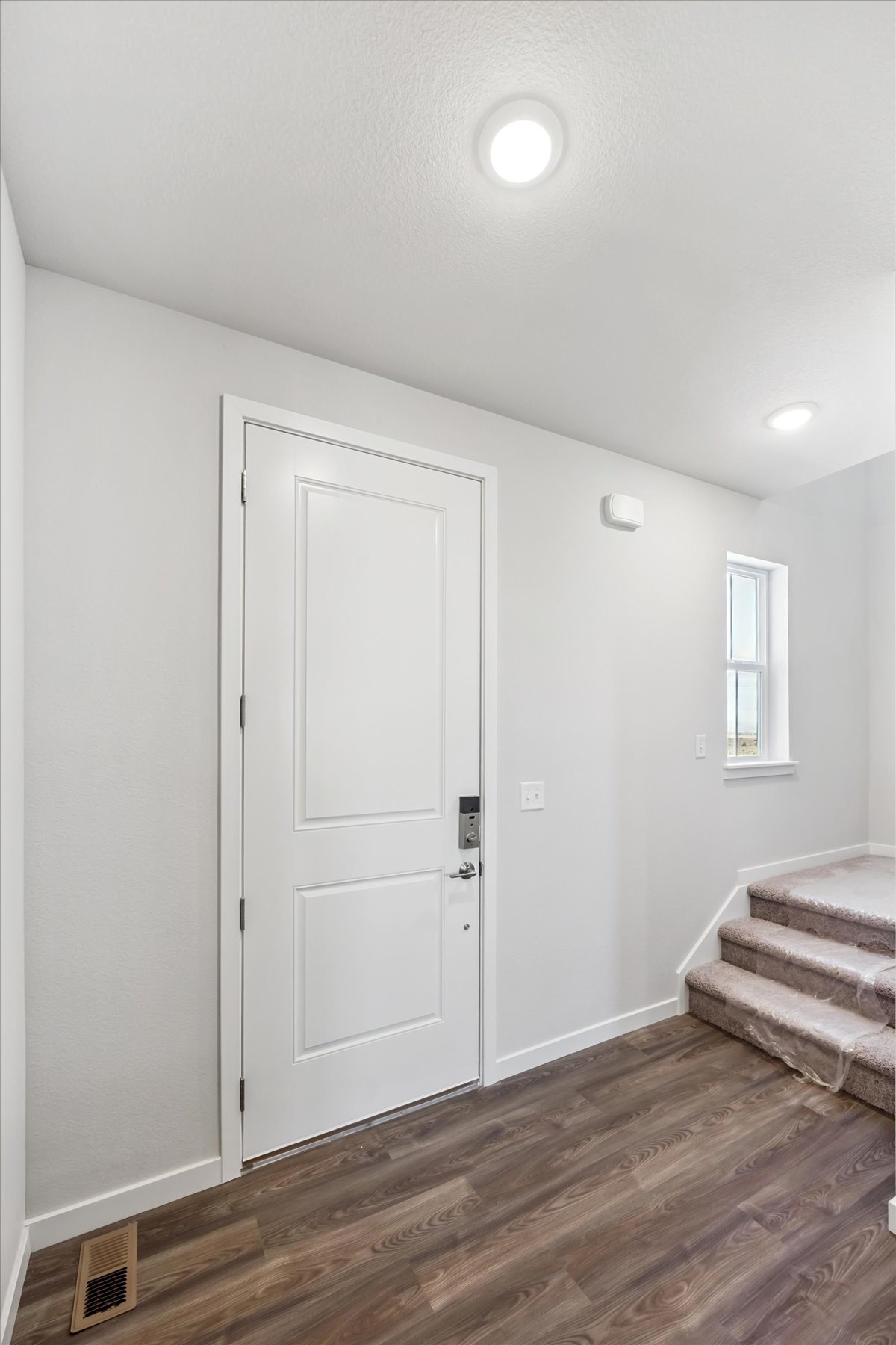 A white door in a room.