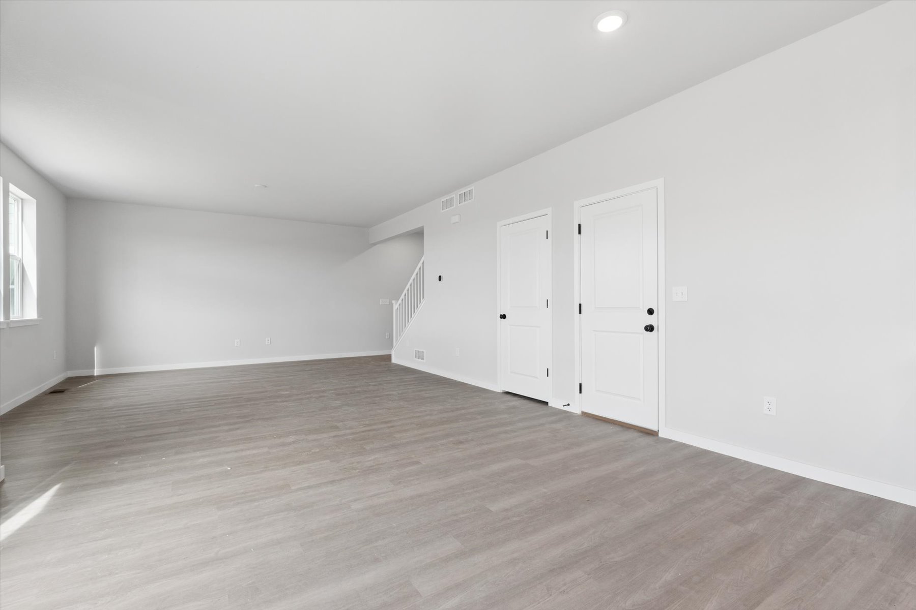 A room with white doors.