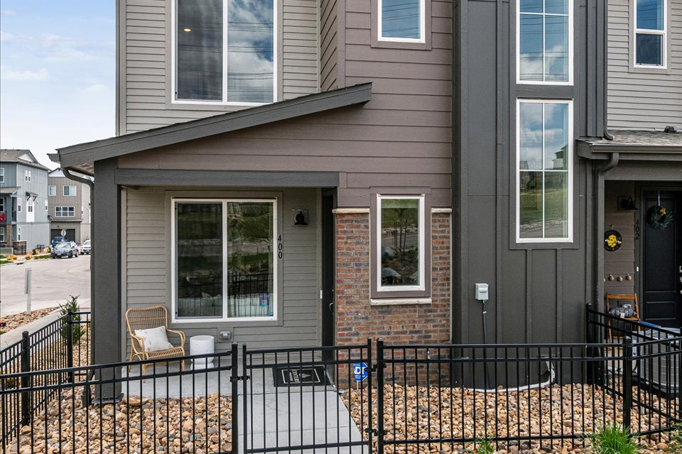 A house with a black fence.