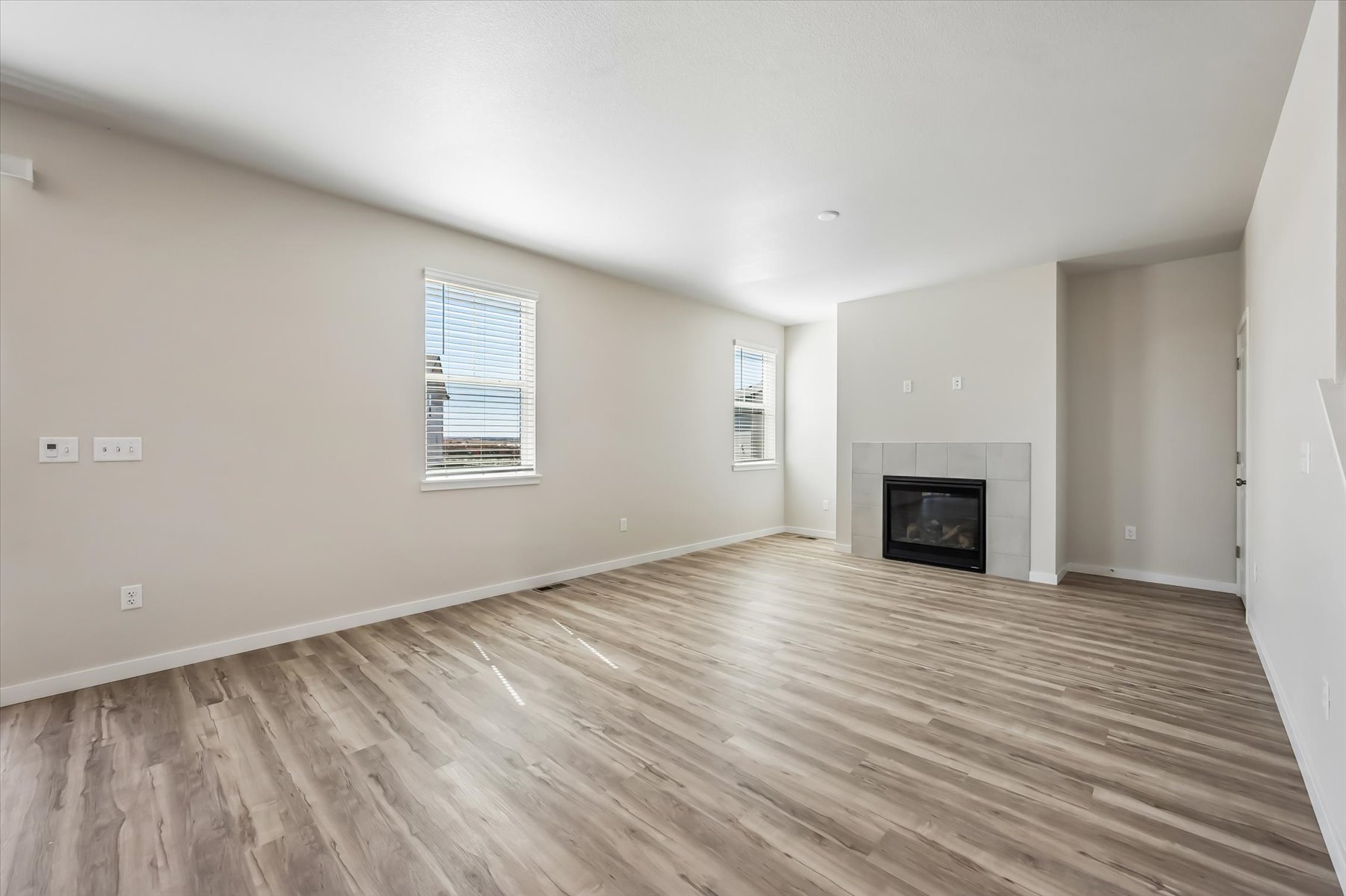 A room with a fireplace.