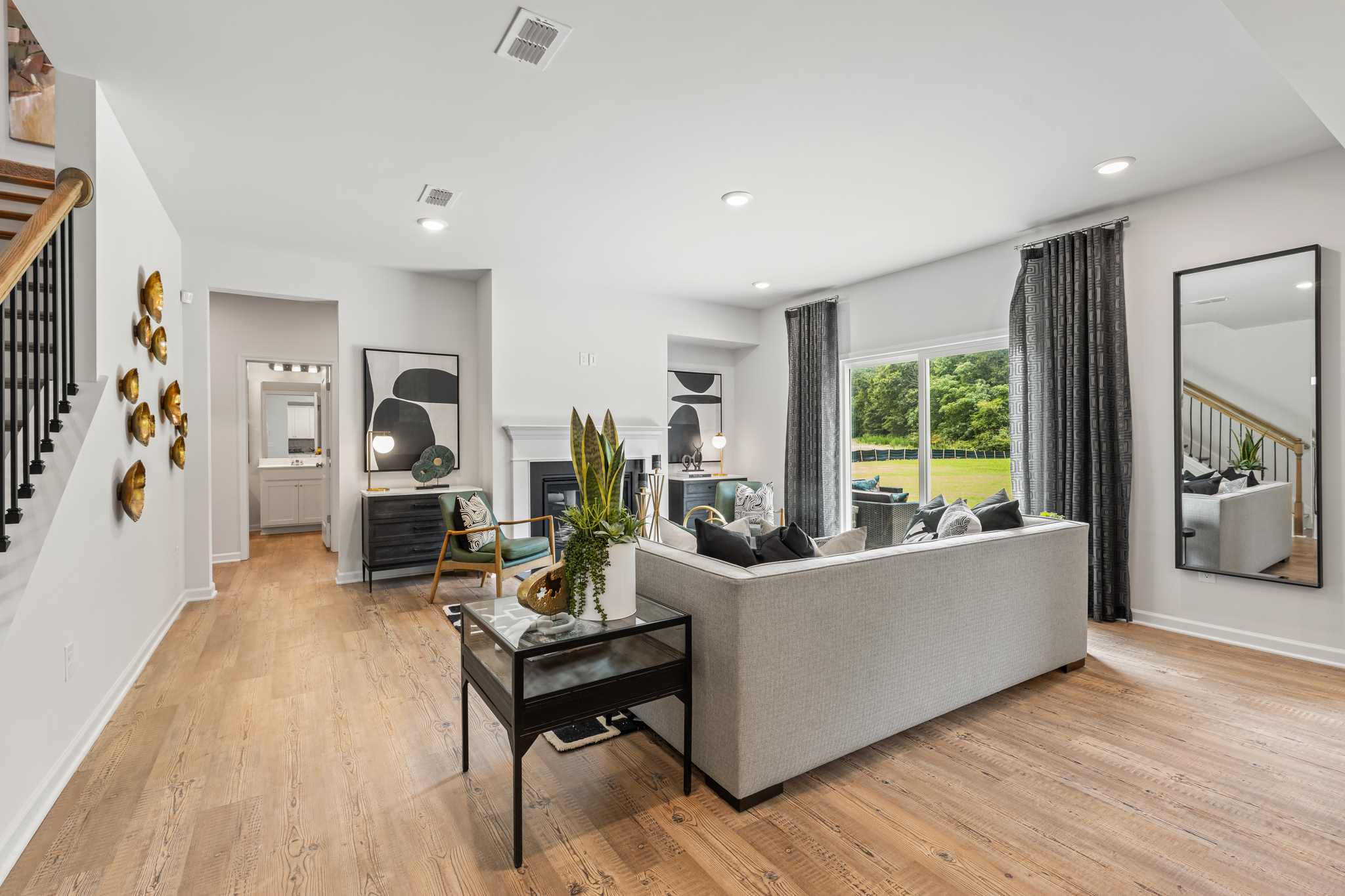 A living room with a couch and a table.