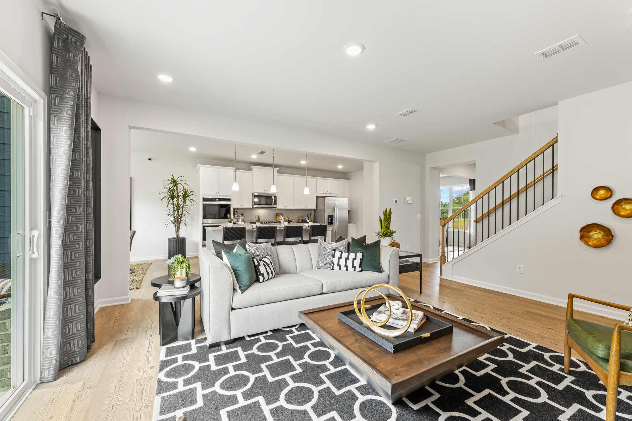 A living room with a couch and a table.