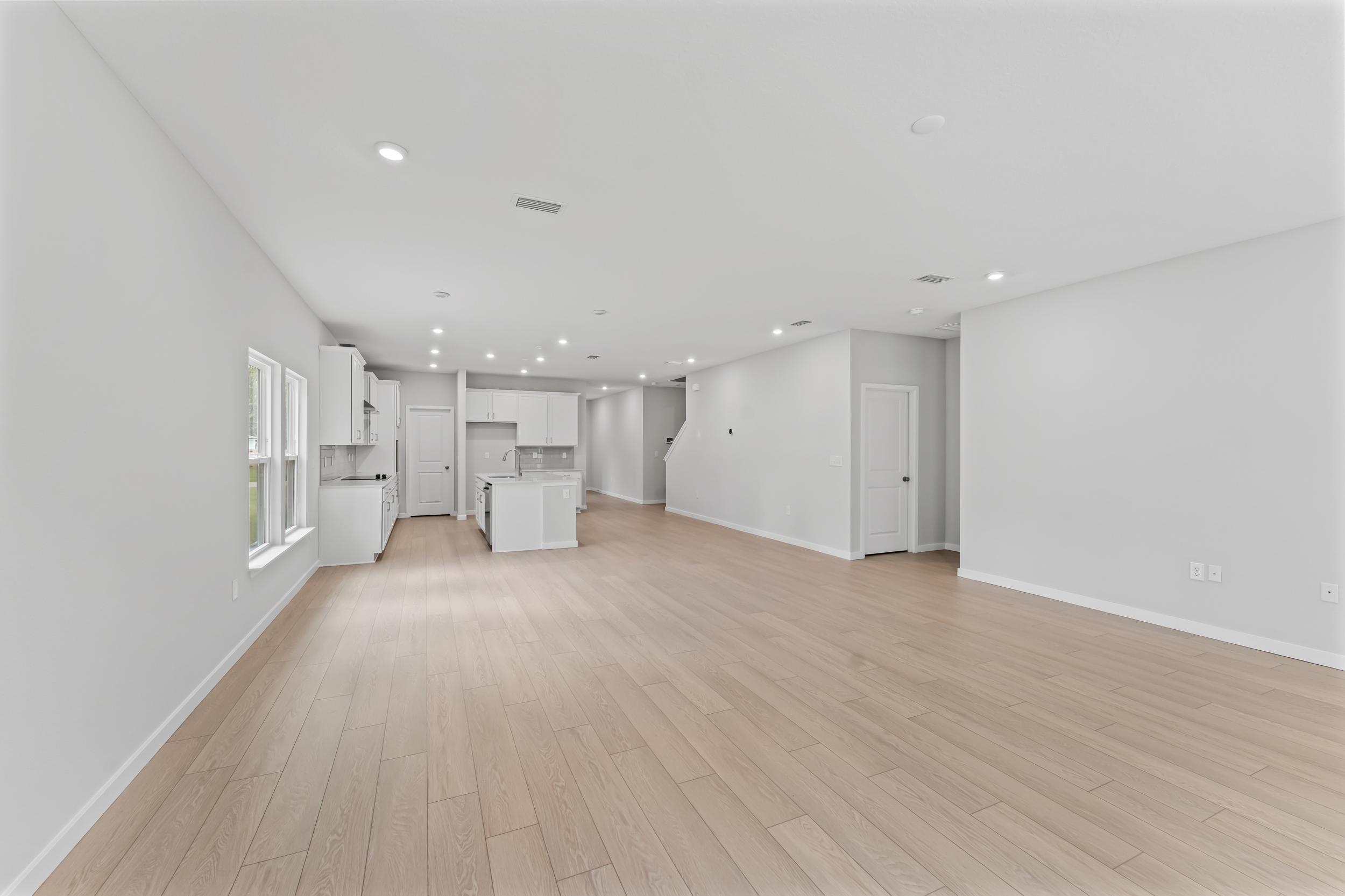 Dogwood Plan Lot 582 Open Living Room Area at NorthShore in Kingsland