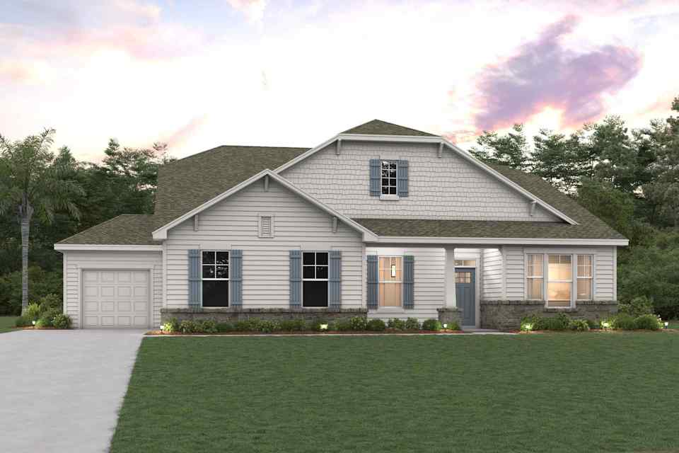 A house with a lawn in front.