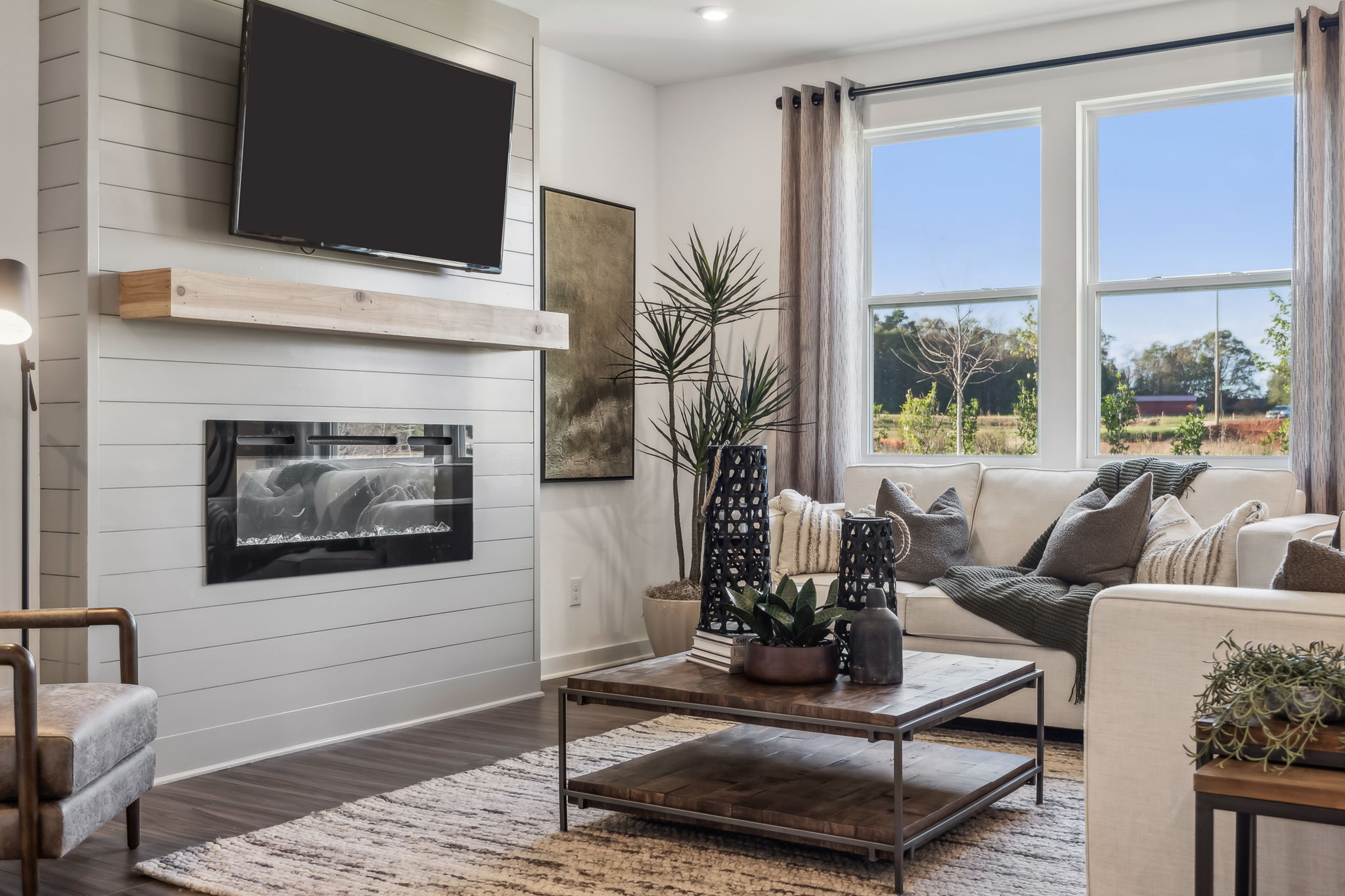 A living room with a fireplace.