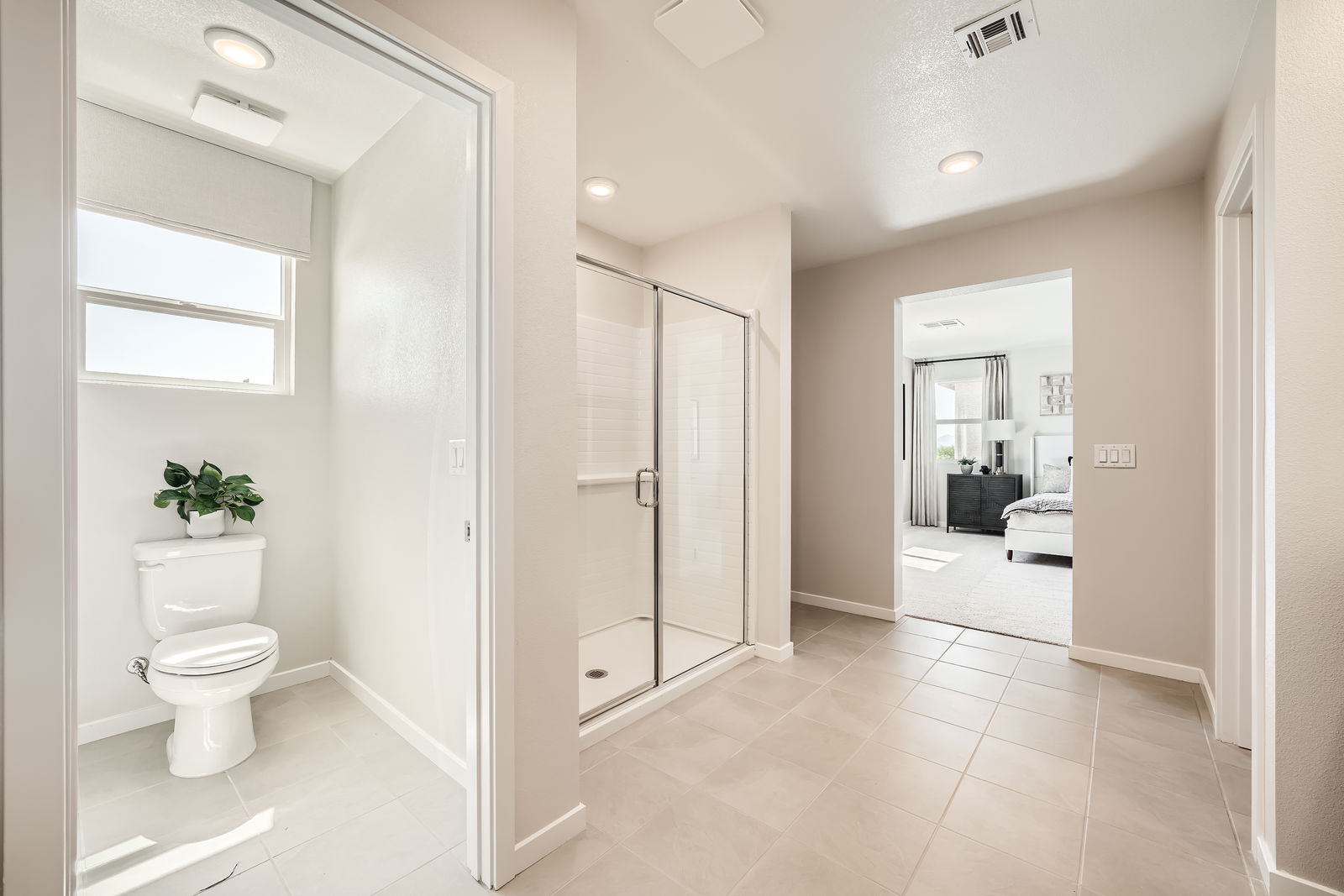 A bathroom with a glass shower.