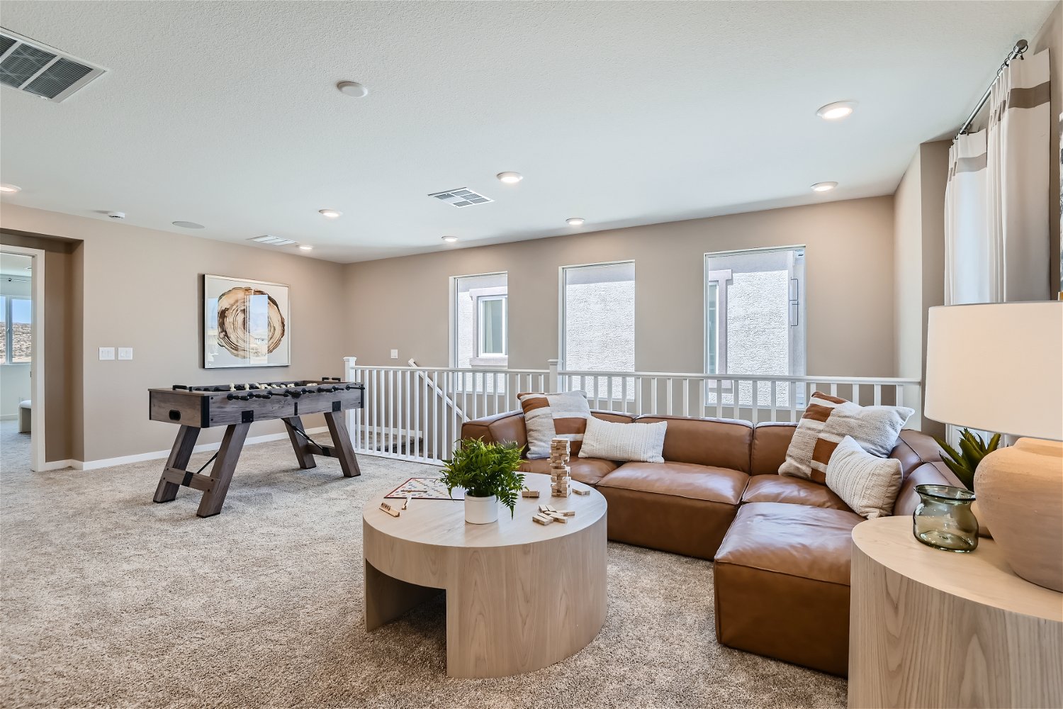 A living room with a couch and coffee table.