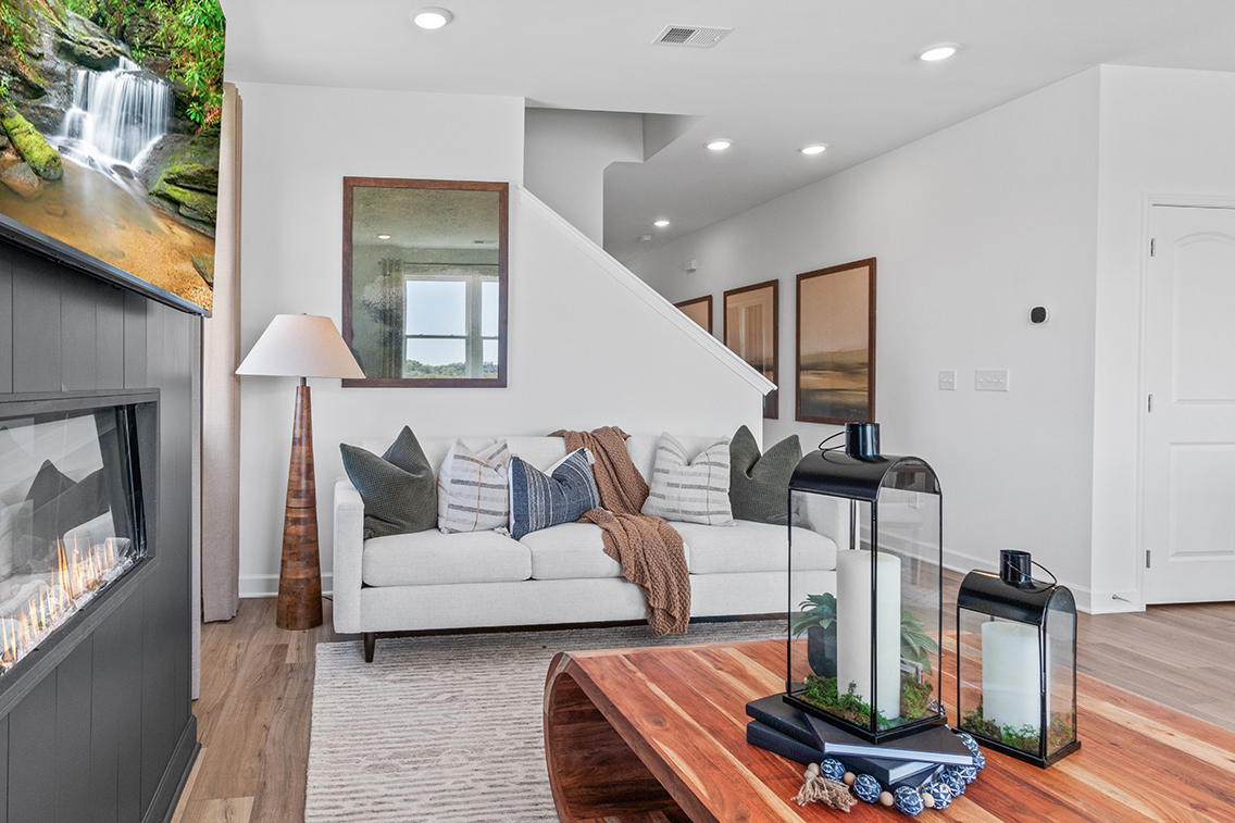 A living room with a fireplace.