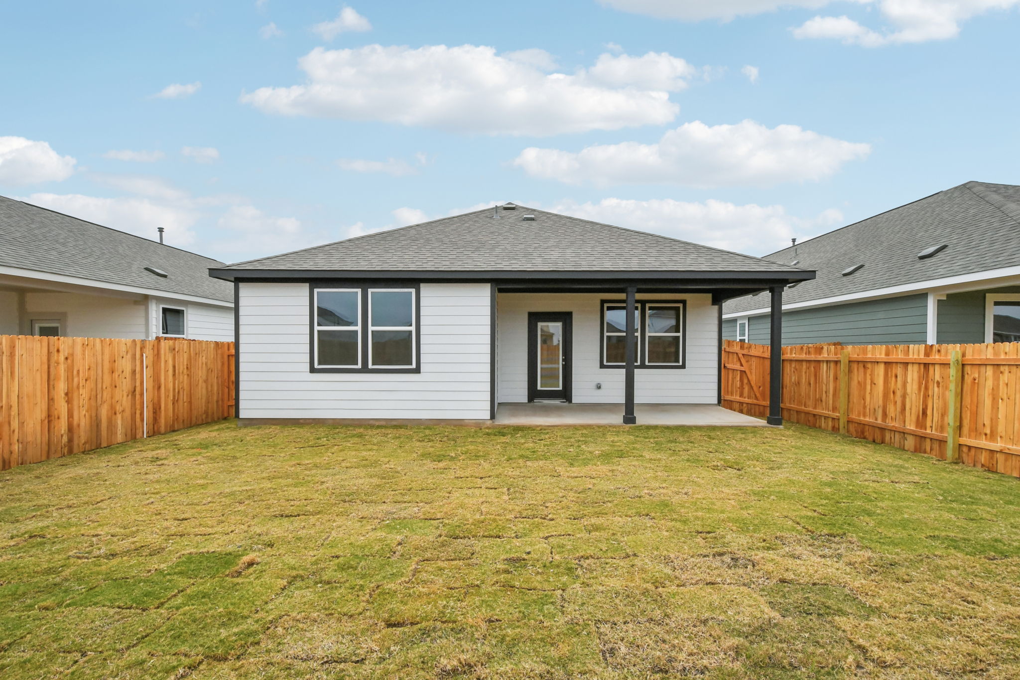 A house with a fence around it.