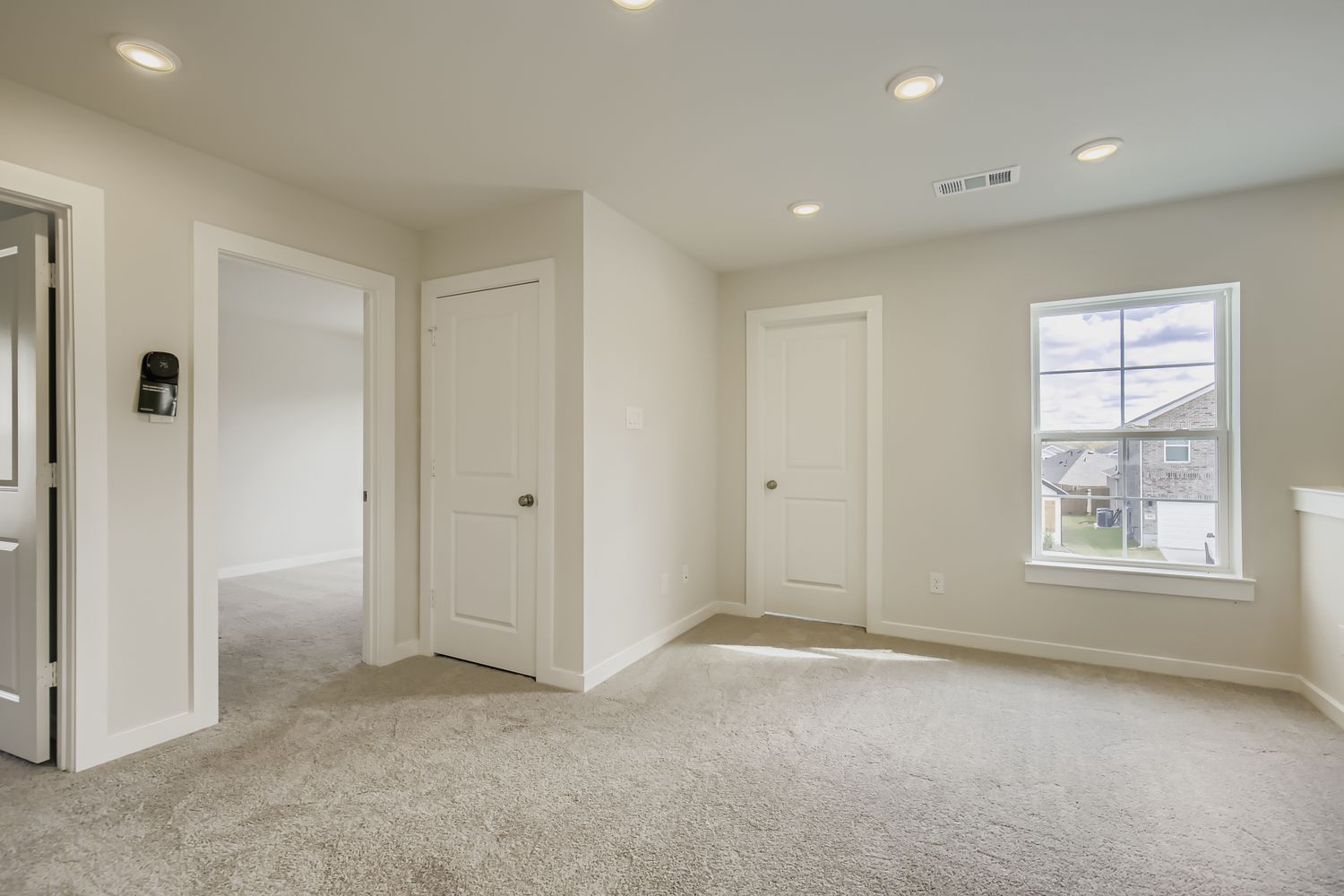 A room with white doors.