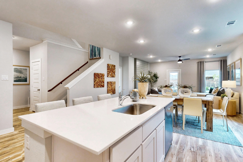 A kitchen with a large island.