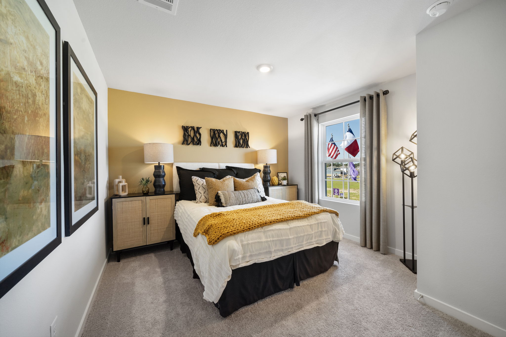 A bedroom with a large bed.