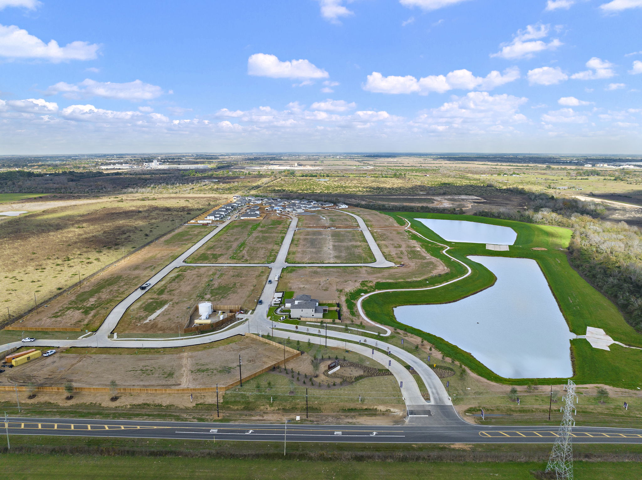 A large area with roads and a body of water in it with Prairie Queen Recreation Area in the background.