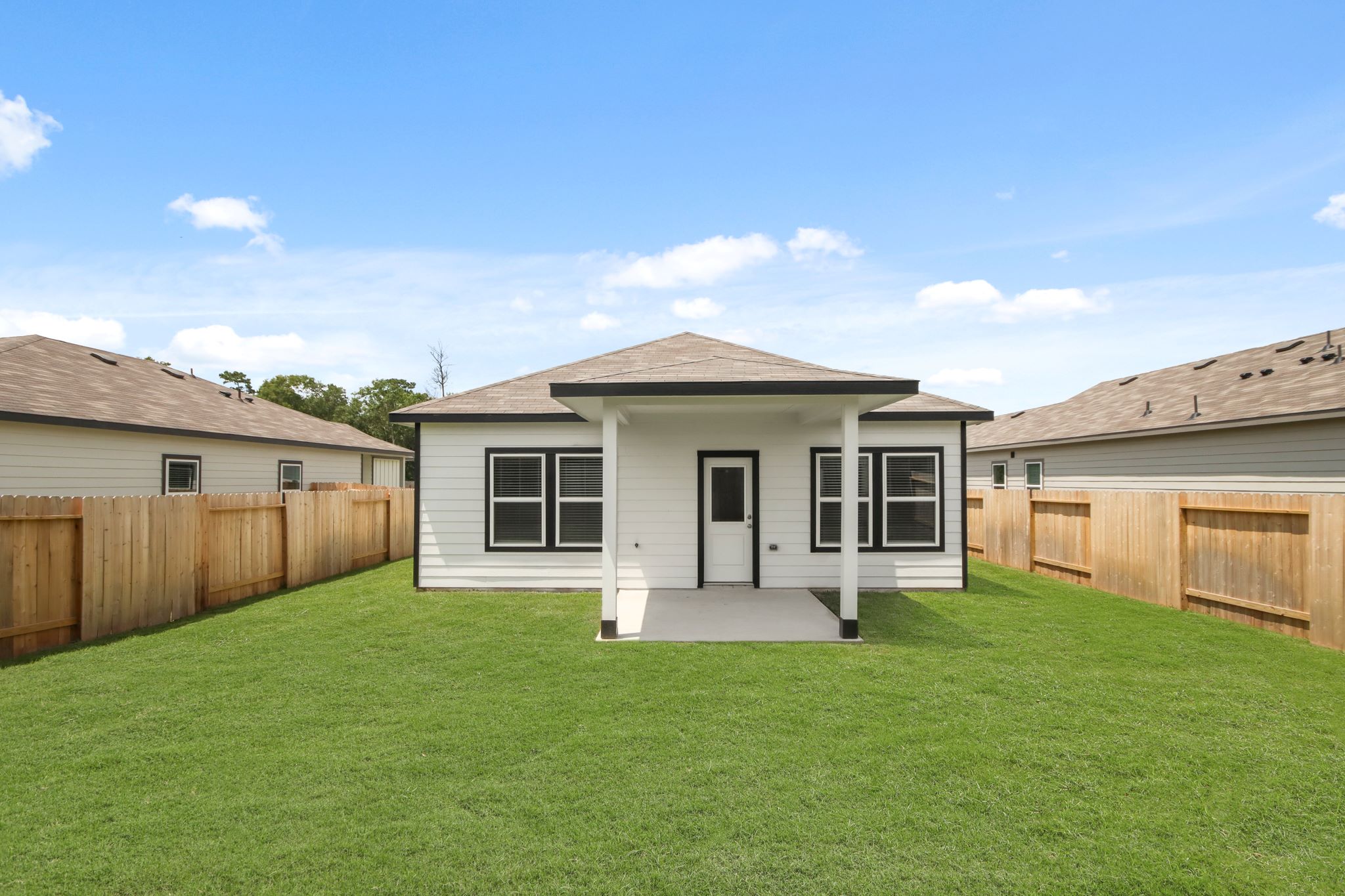 A small white house.