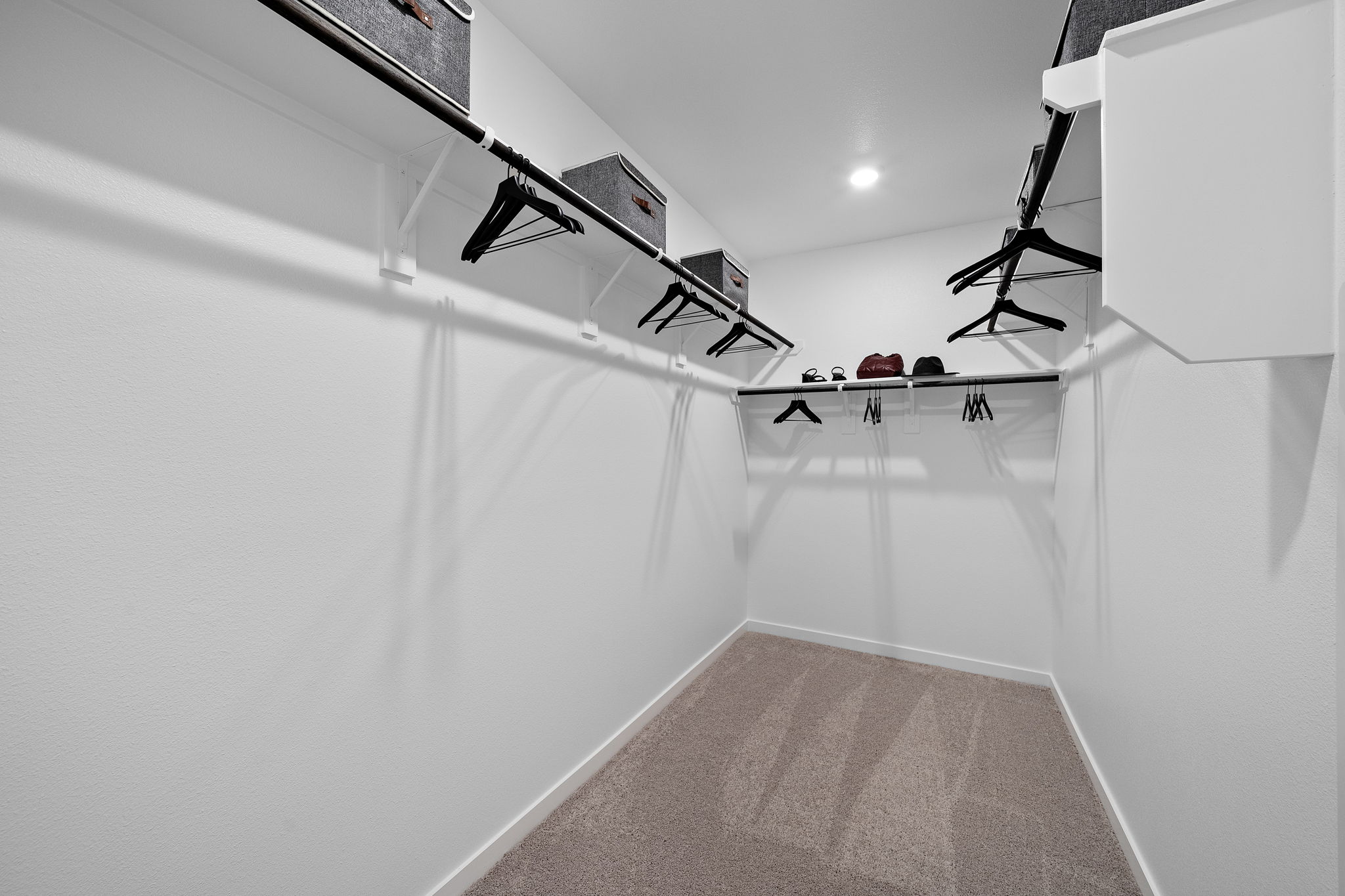 A staircase with a light on the side.