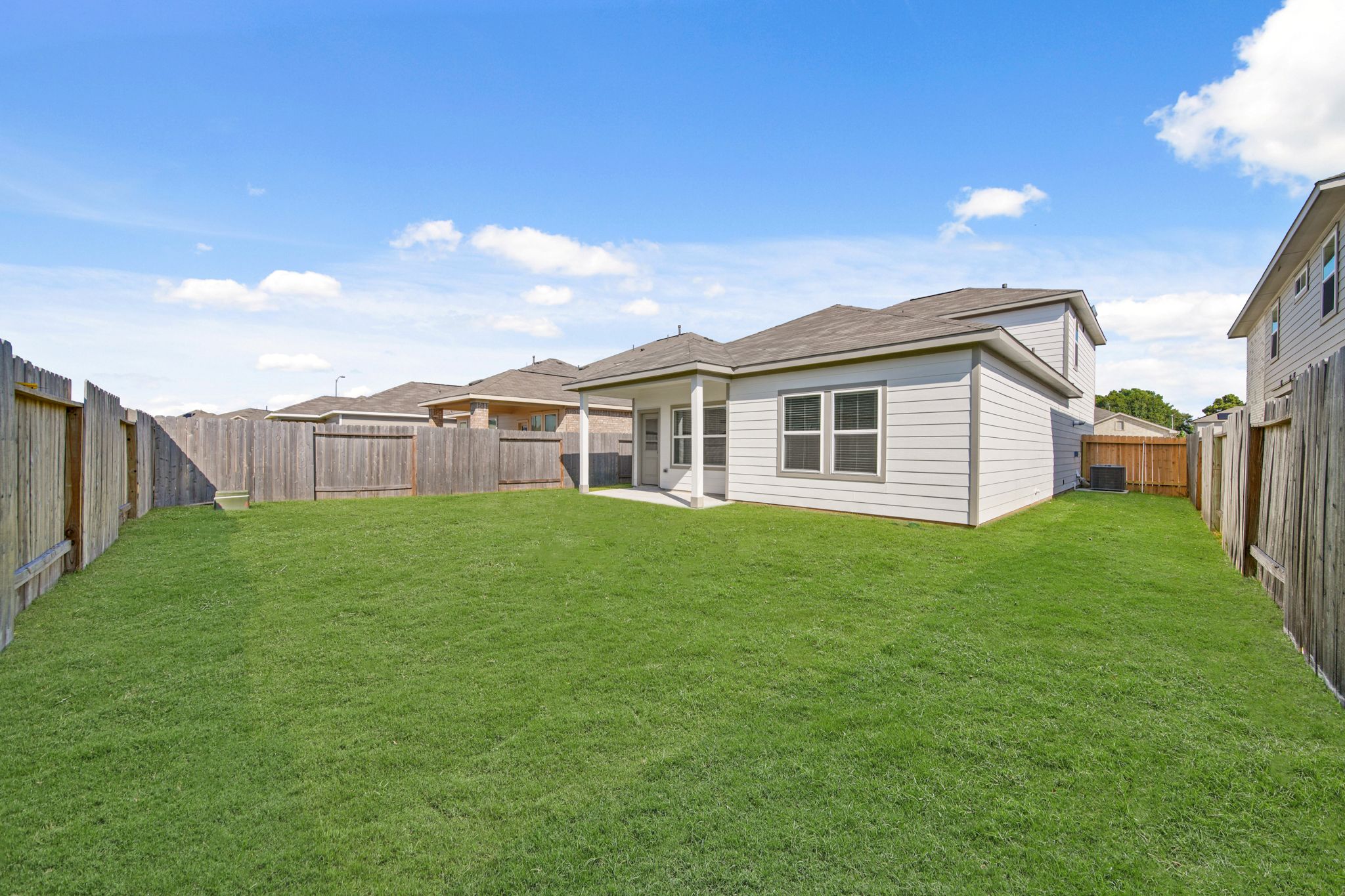 A house with a fence around it.