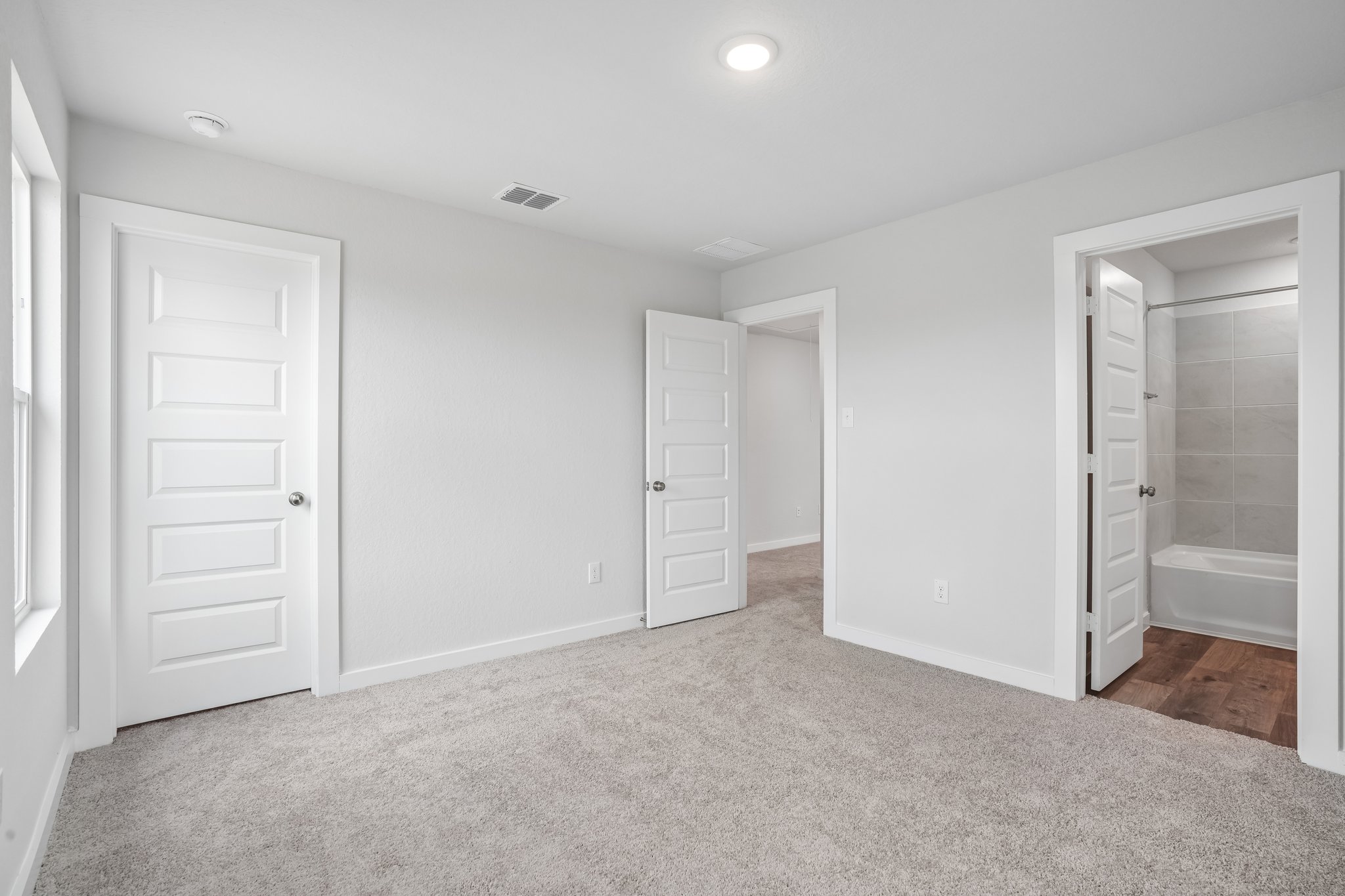 A room with white doors.
