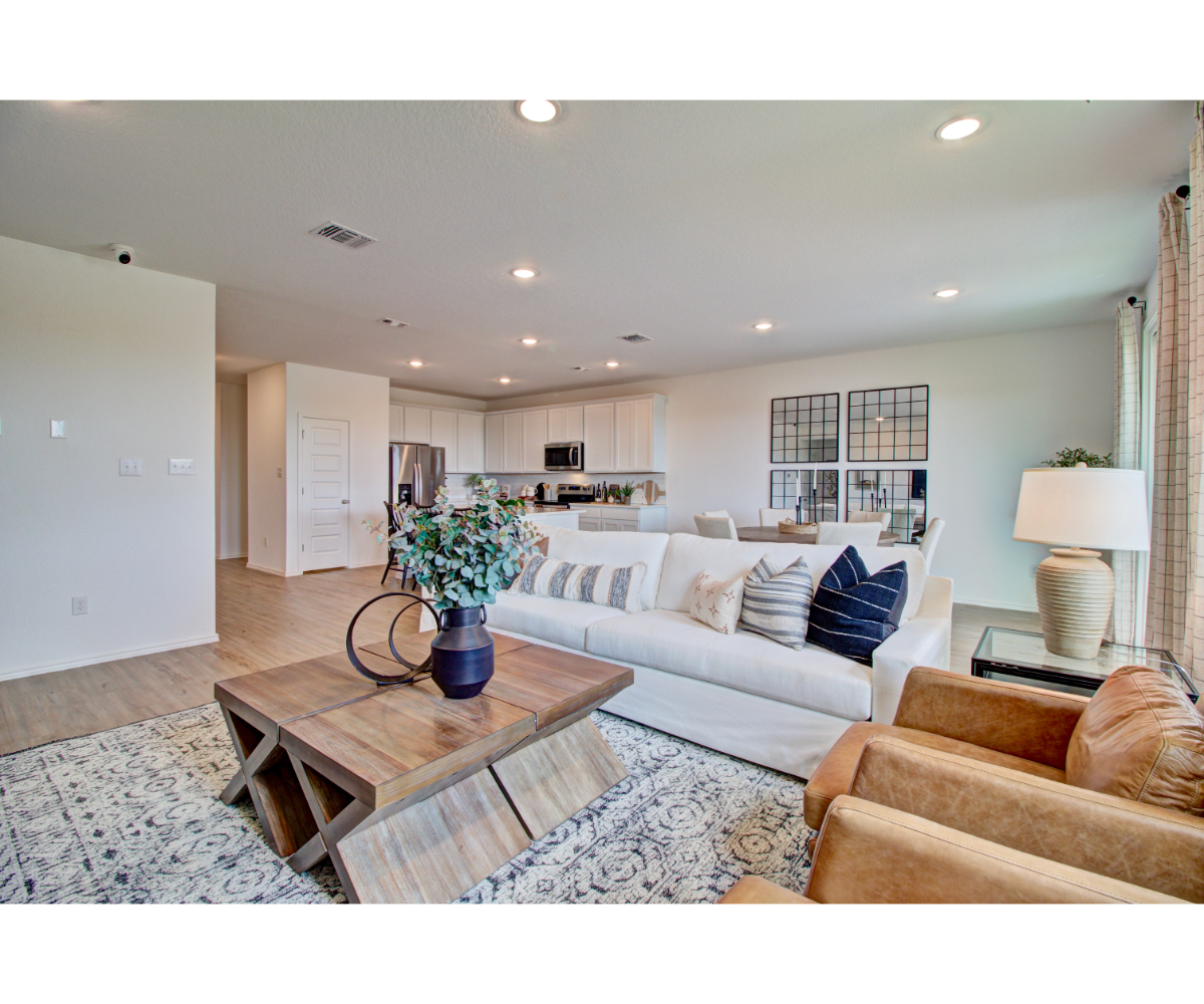 A living room with a couch and a coffee table.