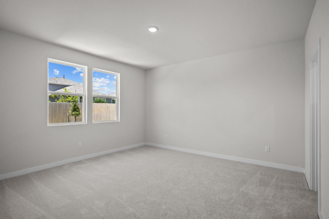 A room with a few windows.
