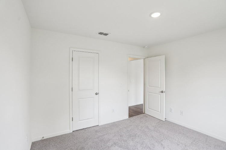 A room with white doors.