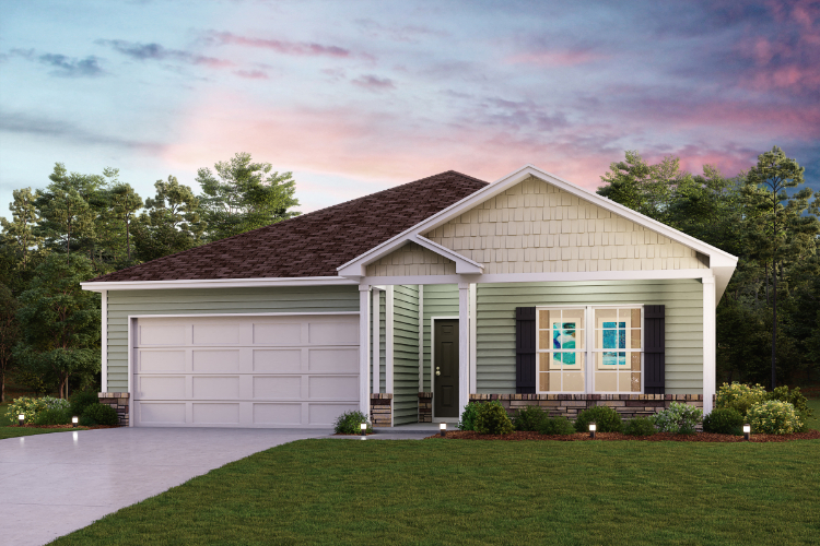 A house with a lawn in front of it.