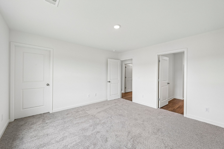 A room with white doors.